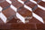 Brown & White Natural Cowhide Hand Stitched Rug - Manhattan Rugs