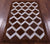 Brown & White Natural Cowhide Hand Stitched Rug - Manhattan Rugs