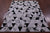 Black & White Natural Cowhide Hand Stitched Rug - Manhattan Rugs
