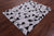 Black & White Natural Cowhide Hand Stitched Rug - Manhattan Rugs
