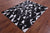Black & White Natural Cowhide Hand Stitched Rug - Manhattan Rugs