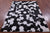 Black & White Natural Cowhide Hand Stitched Rug - Manhattan Rugs