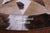 Brown & White Round Natural Cowhide Hand Stitched Rug - Manhattan Rugs