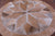 Brown Round Natural Cowhide Hand Stitched Rug - Manhattan Rugs