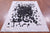 Black & White Natural Cowhide Hand Stitched Rug - Manhattan Rugs