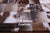 Brown & White Natural Cowhide Hand Stitched Rug - Manhattan Rugs