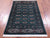 Green Handmade Signed Silky Bokhara Wool Rug - Manhattan Rugs