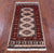 Ivory Signed Silky Bokhara Hand-Knotted Wool Rug 2' 0" X 4' 3" - Q23862