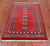 Red 2' 7" X 4' 0" Silky Bokhara Handmade Wool Rug - Q24384