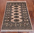 Ivory 2' 6" X 3' 10" Silky Bokhara Hand Knotted Wool Rug - Q24392