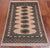 Beige 2' 7" X 4' 2" Silky Bokhara Handmade Wool Rug - Q24421