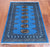 Blue 2' 7" X 3' 11" Silky Bokhara Hand-Knotted Wool Rug - Q24422