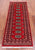 Red 2' 0" X 6' 0" Runner Silky Bokhara Hand Knotted Wool Rug - Q24536