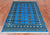 Blue 4' 1" X 6' 2" Silky Bokhara Hand Knotted Wool Rug - Q24558