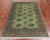 Green 4' 0" X 6' 0" Silky Bokhara Handmade Wool Rug - Q24586