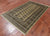 Green 4' 6" X 6' 11" Silky Bokhara Hand Knotted Wool Rug - Q24596