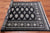 Black 4' 7" X 6' 5" Silky Bokhara Handmade Wool Rug - Q24598