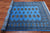 Blue 4' 6" X 6' 11" Silky Bokhara Hand-Knotted Wool Rug - Q24600