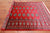 Red 4' 7" X 6' 6" Silky Bokhara Handmade Wool Rug - Q24601
