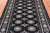 Black 4' 7" X 6' 8" Silky Bokhara Handmade Wool Rug - Q24603