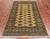 Gold 4' 7" X 7' 1" Silky Bokhara Hand-Knotted Wool Rug - Q24605