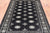 Black 4' 7" X 6' 11" Silky Bokhara Hand-Knotted Wool Rug - Q24607