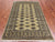 Green 4' 8" X 7' 2" Silky Bokhara Handmade Wool Rug - Q24611