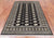 Black 4' 8" X 6' 11" Silky Bokhara Handmade Wool Rug - Q24612