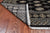 Black 4' 8" X 6' 11" Silky Bokhara Handmade Wool Rug - Q24612