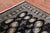 Black 4' 8" X 6' 11" Silky Bokhara Handmade Wool Rug - Q24612