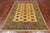 Gold 5' 8" X 8' 0" Silky Bokhara Hand-Knotted Wool Rug - Q24628
