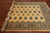 Gold 5' 8" X 8' 0" Silky Bokhara Hand-Knotted Wool Rug - Q24628