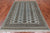 Grey 5' 5" X 8' 0" Silky Bokhara Hand-Knotted Wool Rug - Q24632