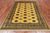 Gold 5' 5" X 7' 9" Silky Bokhara Hand Knotted Wool Rug - Q24638