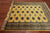 Gold 5' 5" X 7' 9" Silky Bokhara Hand Knotted Wool Rug - Q24638