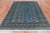 Blue 5' 7" X 7' 11" Silky Bokhara Hand-Knotted Wool Rug - Q24640