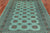 Green 5' 8" X 8' 1" Silky Bokhara Handmade Wool Rug - Q24664