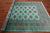 Green 5' 8" X 8' 1" Silky Bokhara Handmade Wool Rug - Q24664