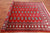 Red 5' 7" X 7' 9" Silky Bokhara Hand Knotted Wool Rug - Q24665