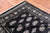 Black 5' 7" X 8' 3" Silky Bokhara Hand-Knotted Wool Rug - Q24671