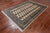 Ivory 5' 6" X 7' 10" Silky Bokhara Hand-Knotted Wool Rug - Q24673