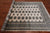 Ivory 5' 6" X 7' 10" Silky Bokhara Hand-Knotted Wool Rug - Q24673