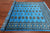 Blue 6' 0" X 8' 7" Silky Bokhara Hand-Knotted Wool Rug - Q24683