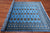 Blue 6' 3" X 9' 0" Silky Bokhara Hand Knotted Wool Rug - Q24702