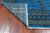 Blue 6' 0" X 8' 10" Silky Bokhara Hand-Knotted Wool Rug - Q24704
