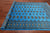 Blue 6' 0" X 8' 10" Silky Bokhara Hand-Knotted Wool Rug - Q24704