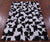 Black & White Natural Cowhide Hand Stitched Rug - Manhattan Rugs