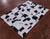Black & White Natural Cowhide Hand Stitched Rug - Manhattan Rugs