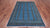 Blue 6' 3" X 9' 0" Silky Bokhara Hand Knotted Wool Rug - Q24702