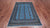 Blue 5' 6" X 8' 2" Silky Bokhara Hand Knotted Wool Rug - Q24667
